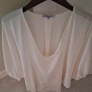 Chic White Blouse by [Brand]